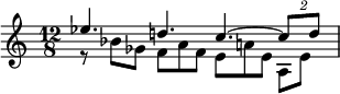 {\time 12/8 << \relative ees'' { ees4. d! c~ \tuplet 2/3 {c8 d} } \\ \relative bes' { r8 bes ges f a f e a! e a,[ e'] }>>}